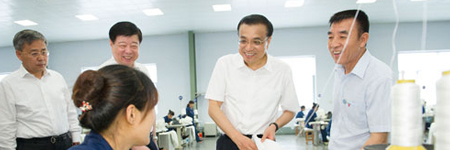 李克强赞环保企业理念：“化污泥为资源”